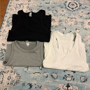 Women's Black, Gray, and White Tank Tops
CAN SELL SEPARATELY